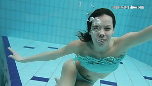 Slender babe Gazel Podvodkova is stripping under the water