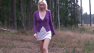 Shameless teen Yulia takes off her panties and pisses in the field