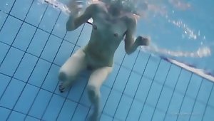 Cute bikini chick goes for a sexy swim